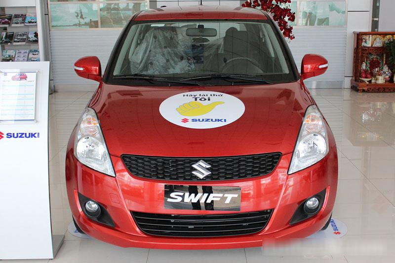 Đánh giá xe Suzuki Swift 2014 có phần đầu thiết kế trẻ trung, đơn giản.